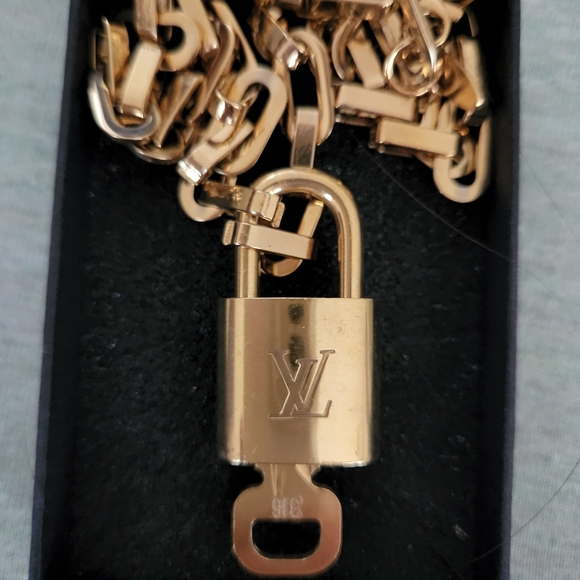 Authentic Louis Vuitton lock pendant - Picture 10 of 10